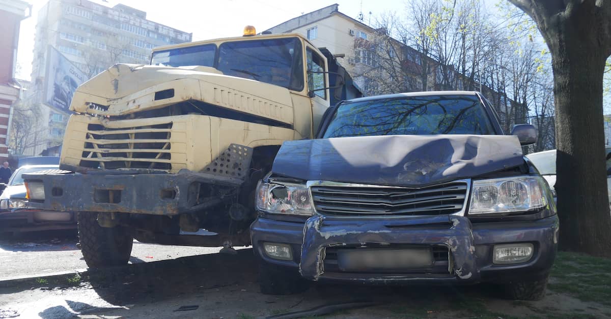 A truck and a car, both damaged from crashes. | Maggiano, DiGirolamo & Lizzi