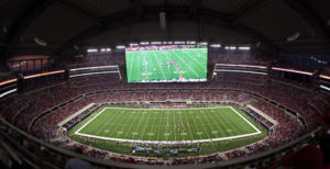 pro football stadium with live game