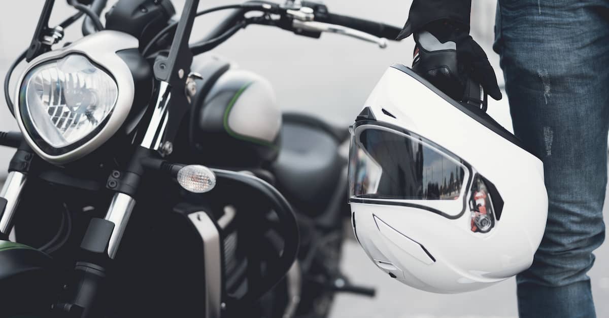 Motorcycle helmet, bike, and motorcyclist. | Maggiano, DiGirolamo & Lizzi