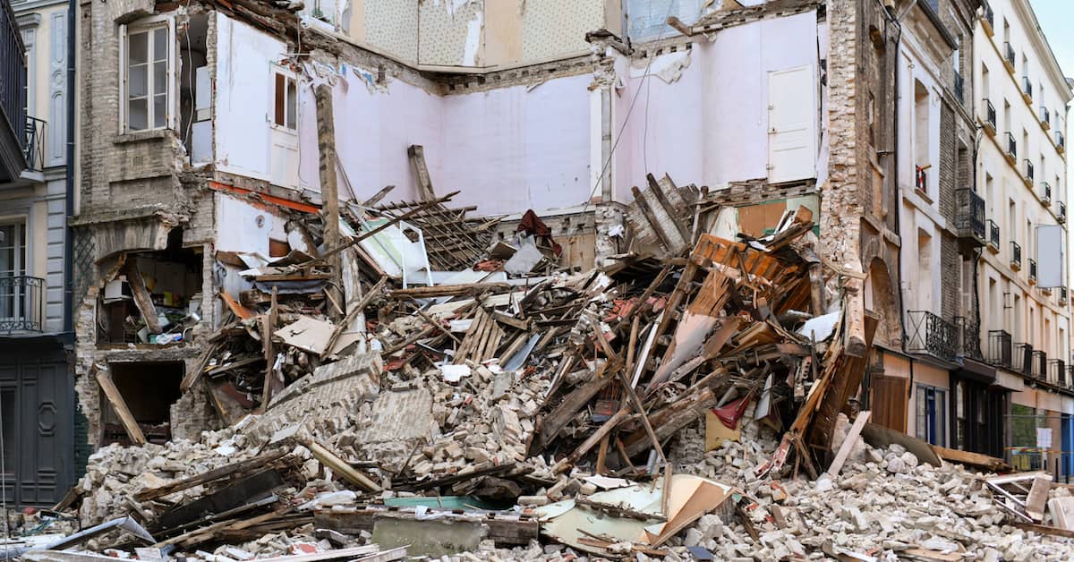 side of a collapsed house after structural failure