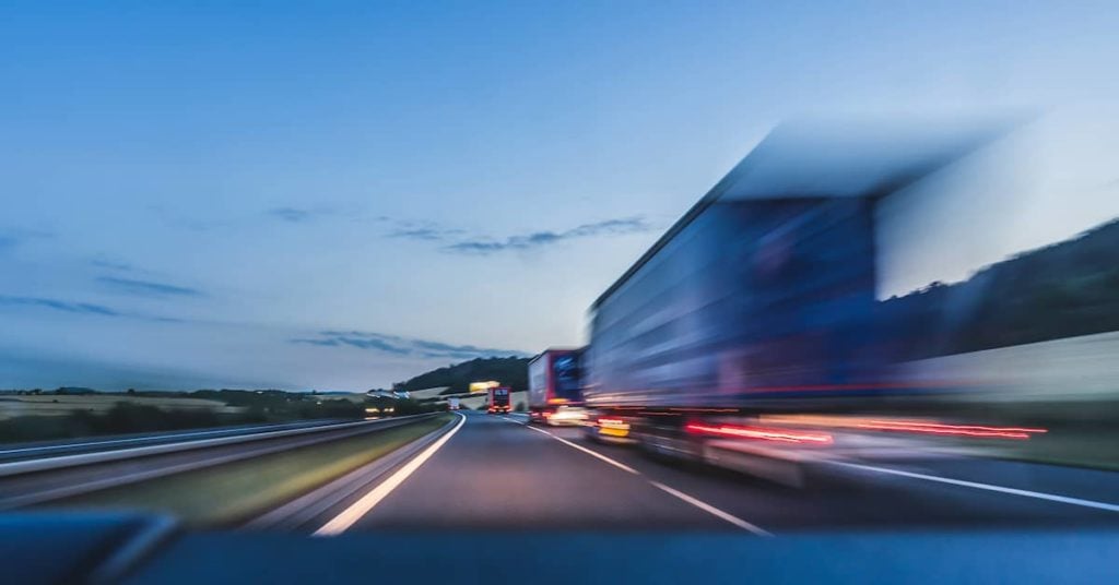 semi-truck speeding on a highway
