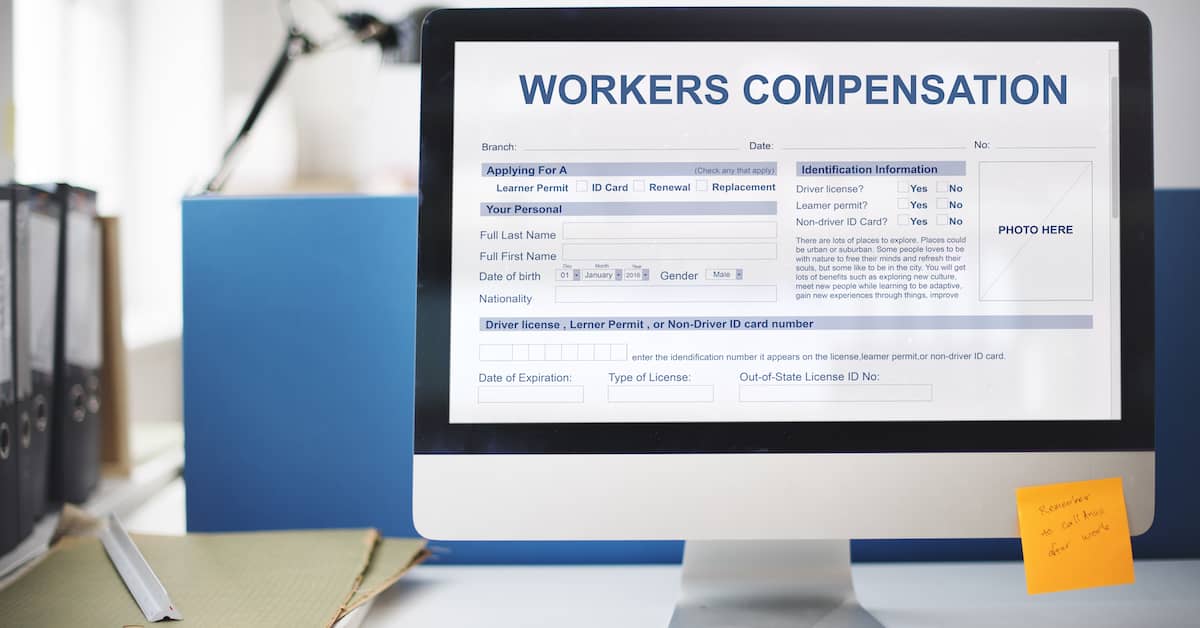 computer with workers' compensation form on the screen