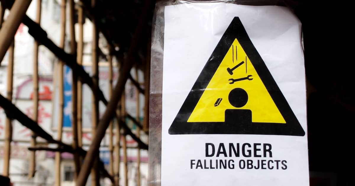 sign on a construction site reading 'Danger: Falling Objects'