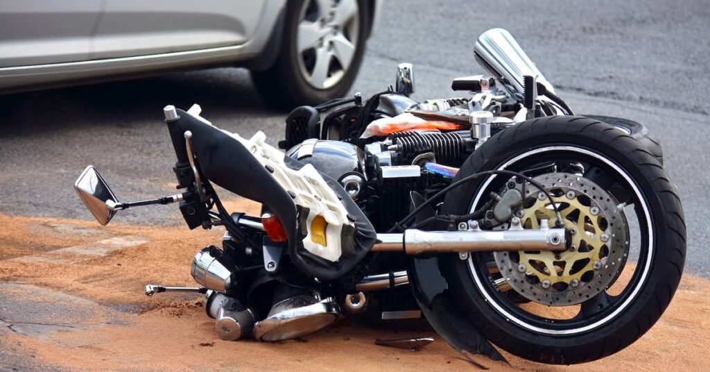 motorcycle damaged in collision with car