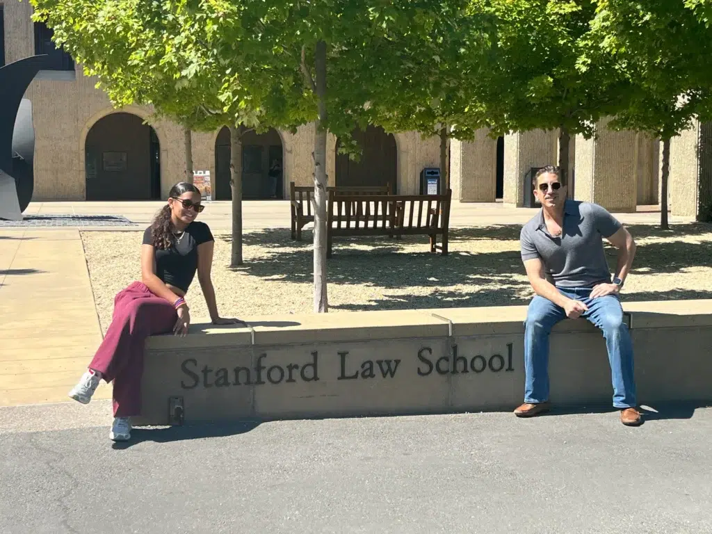 Mercedes and her father, Joseph, enjoy the Stanford Law School campus following graduation day.