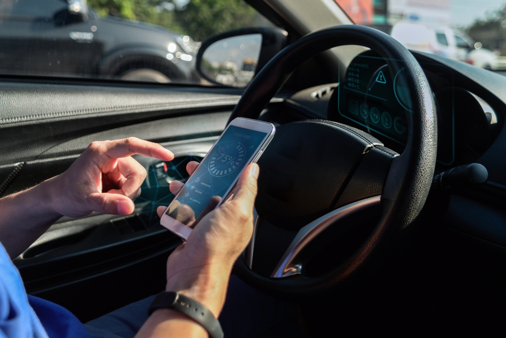 Photo of distracted driver texting