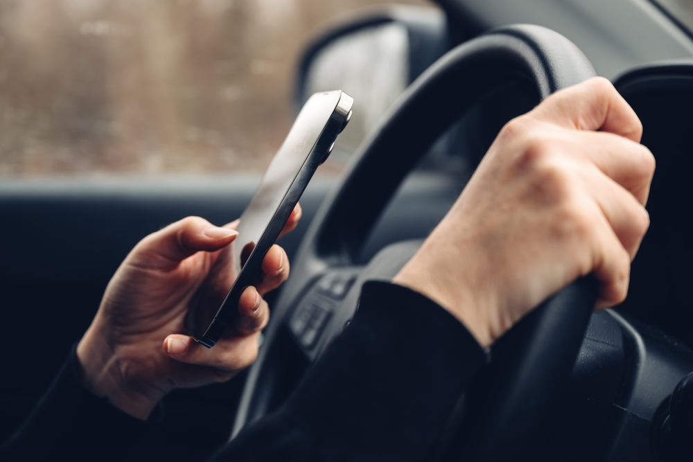 Photo of driver texting