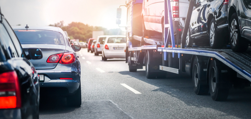 Cars rush hours city street. Car on highway in traffic jam on road.